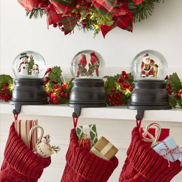 The Christmas Stocking Holding Snowglobes
